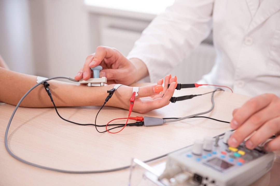 Patient nerves testing using electromyography at medical center