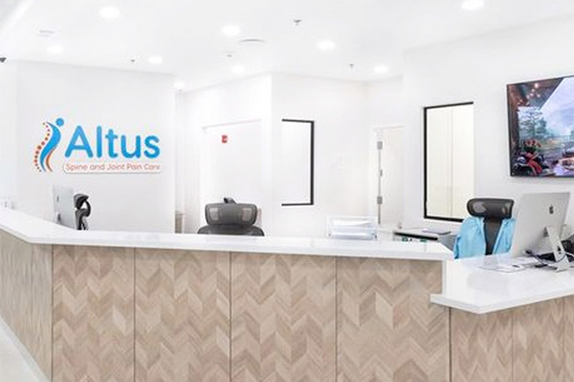 Altius Dental Office reception desk, designed for patient comfort, with friendly staff ready to assist with dental inquiries.