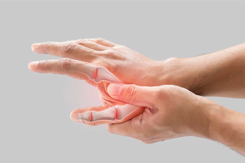 A man has a sore palm because of inflammation of the finger bone.